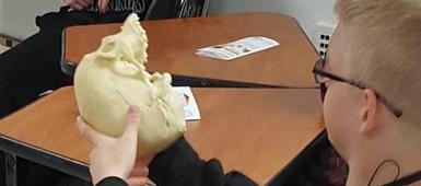 Reach students learn about forensic science hands-on with help from Syracuse University